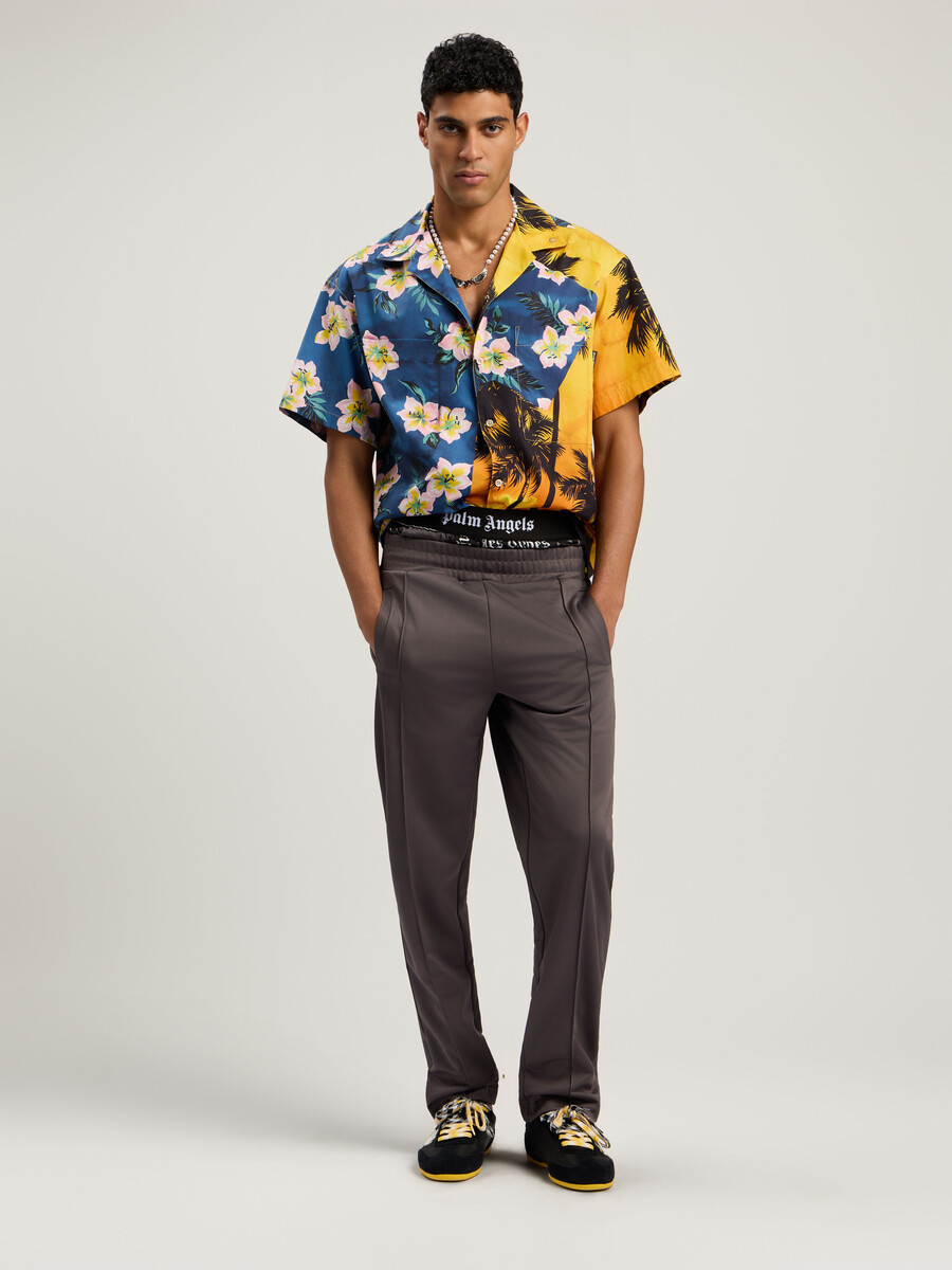 pantalones deportivos con logotipo curvo