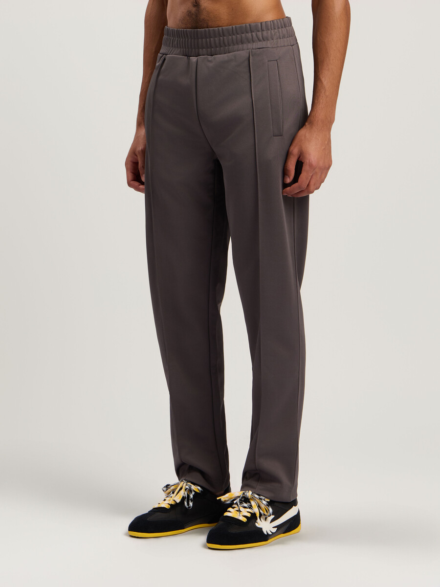 pantalones deportivos con logotipo curvo
