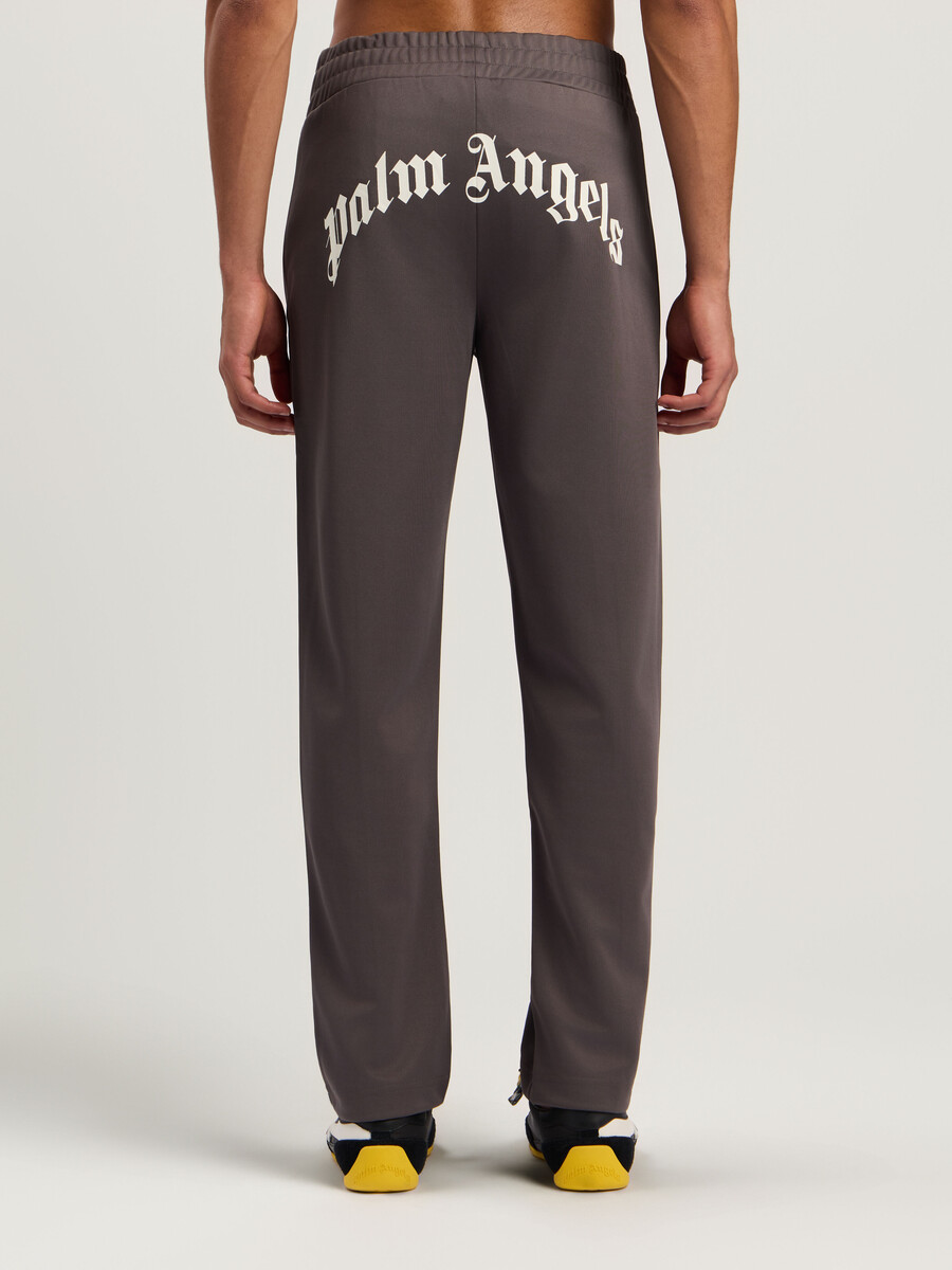 pantalones deportivos con logotipo curvo