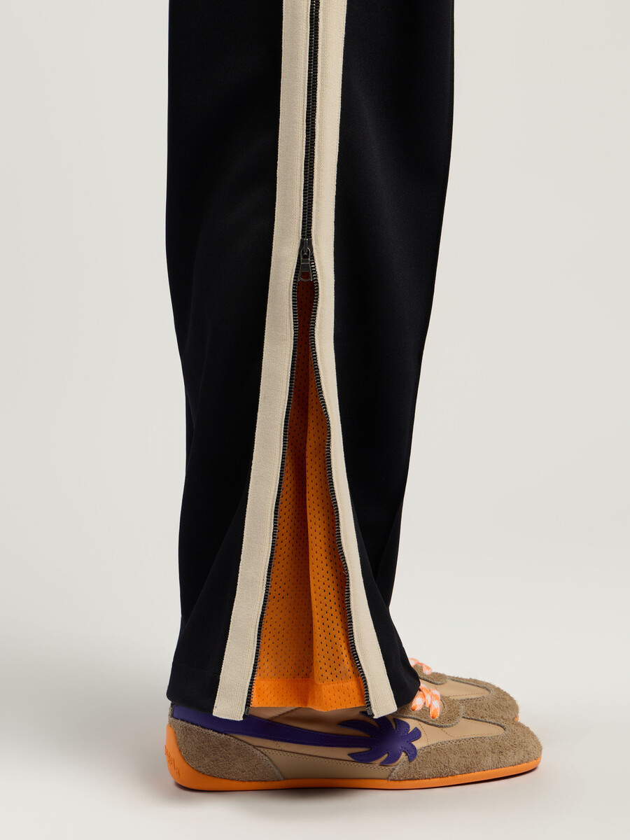 pantalones deportivos de alto rendimiento con cremallera