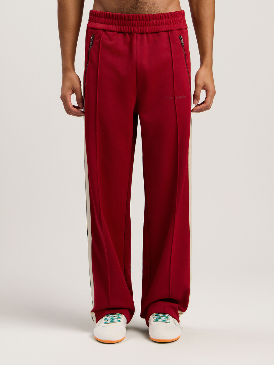 pantalones deportivos con cremallera y logotipo clásico