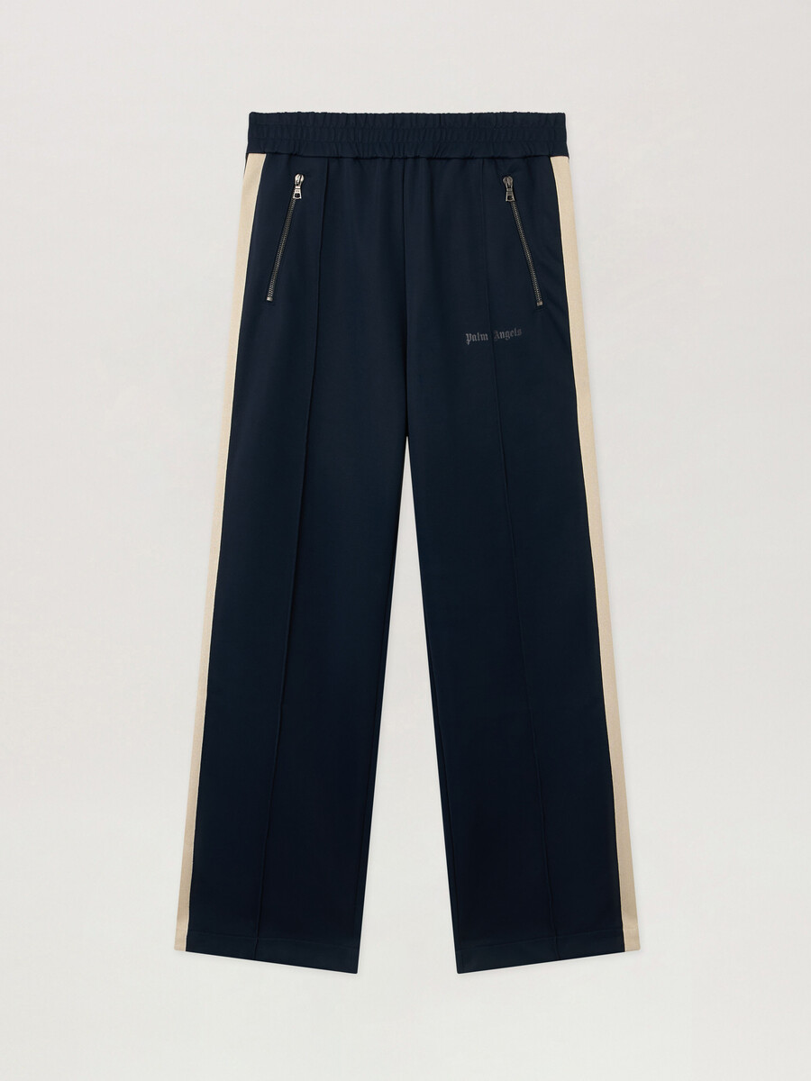 pantalones deportivos con cremallera y logotipo clásico