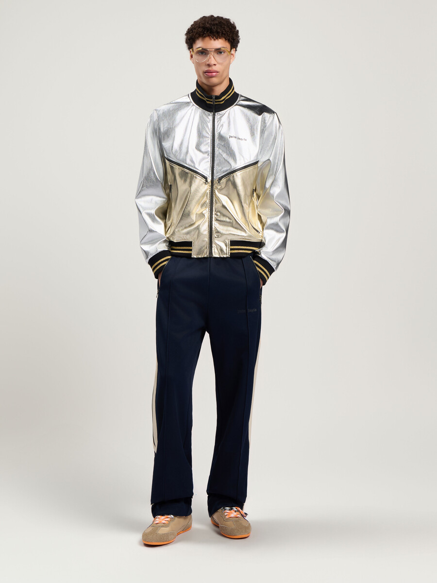 pantalones deportivos con cremallera y logotipo clásico