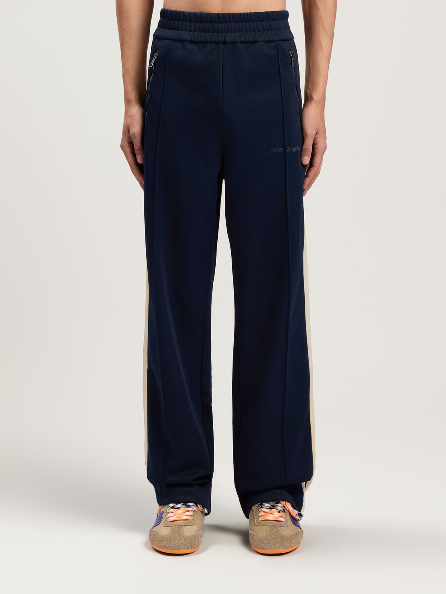 pantalones deportivos con cremallera y logotipo clásico