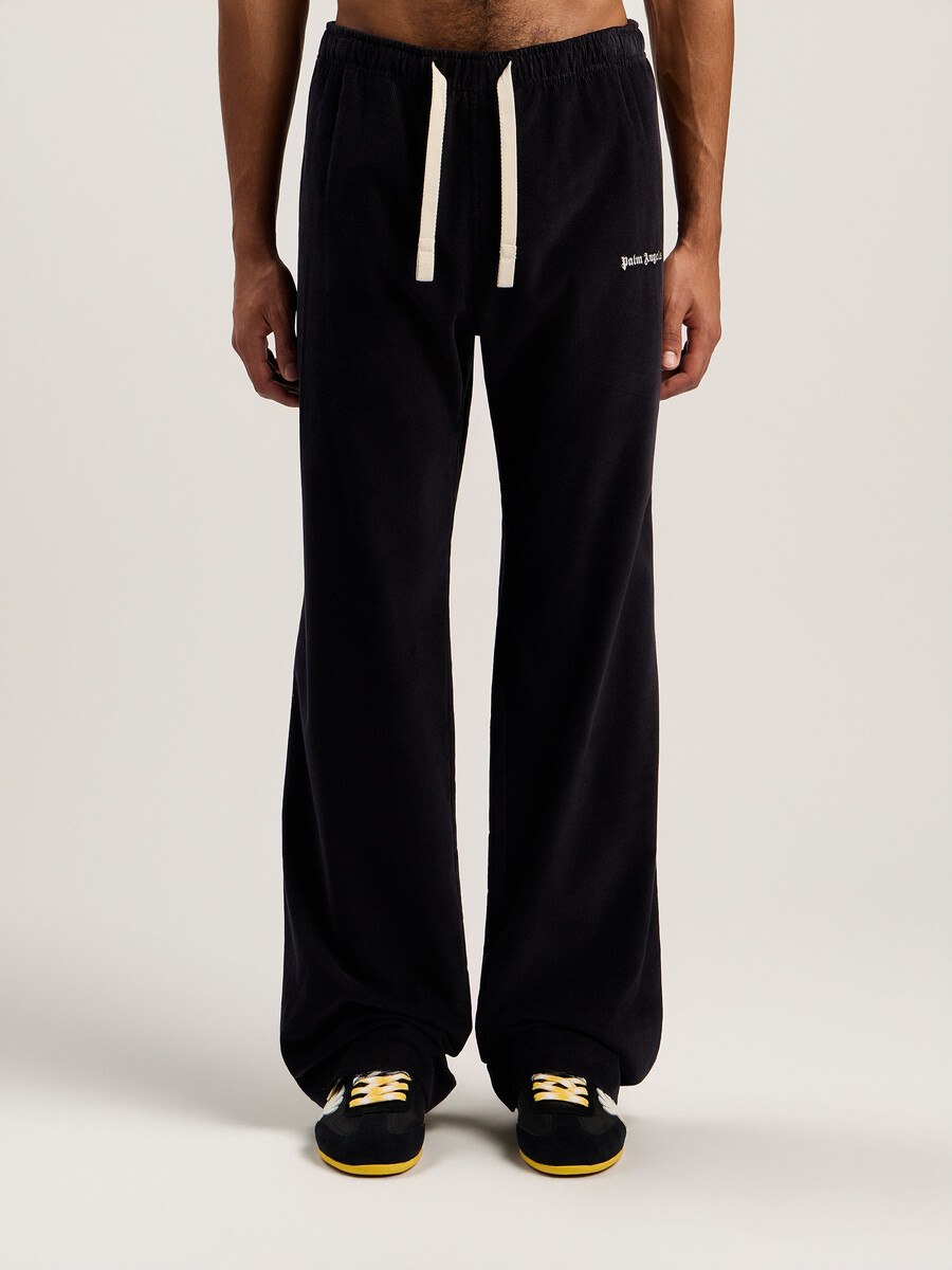 pantalones de viaje de pana con logotipo clásico