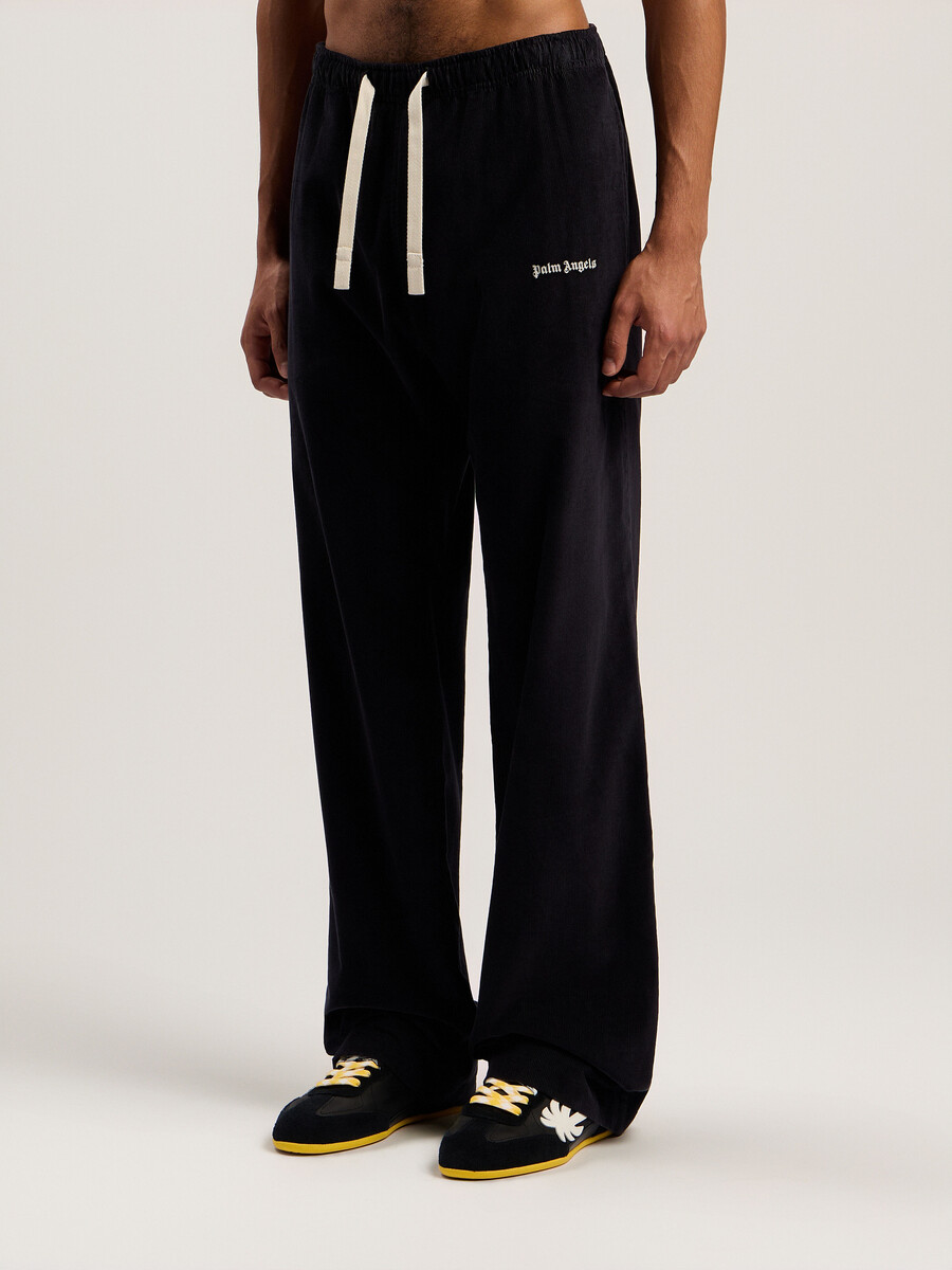 pantalones de viaje de pana con logotipo clásico