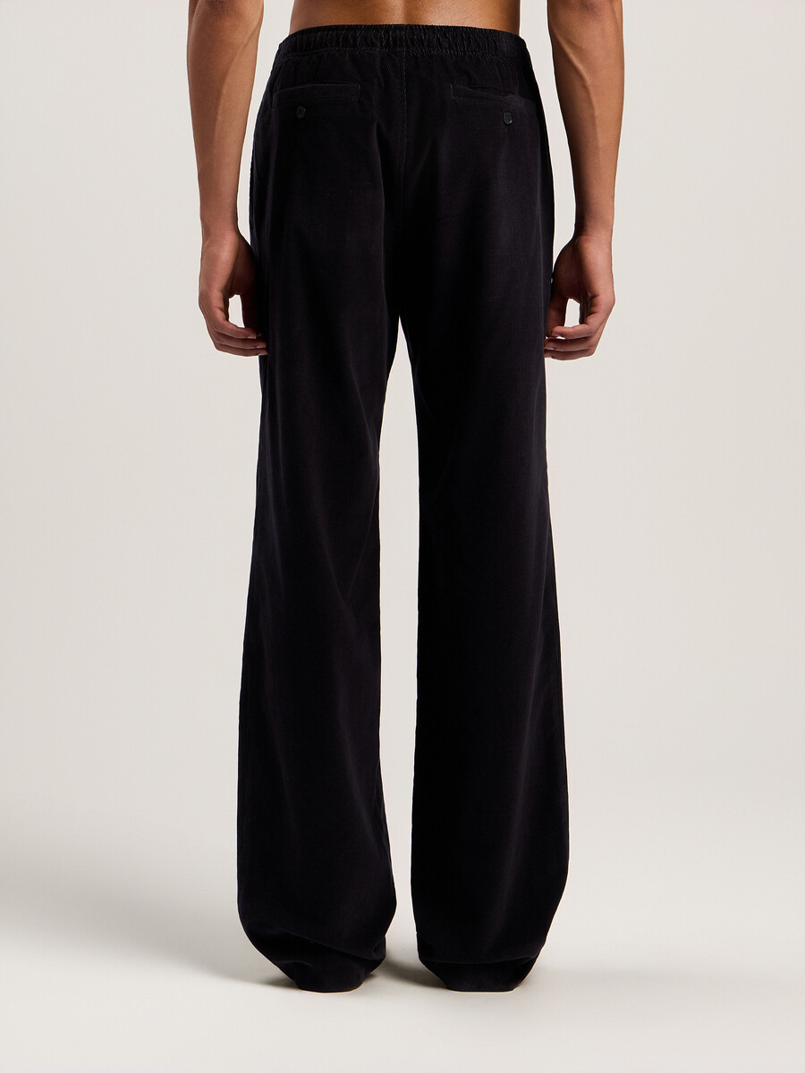 pantalones de viaje de pana con logotipo clásico