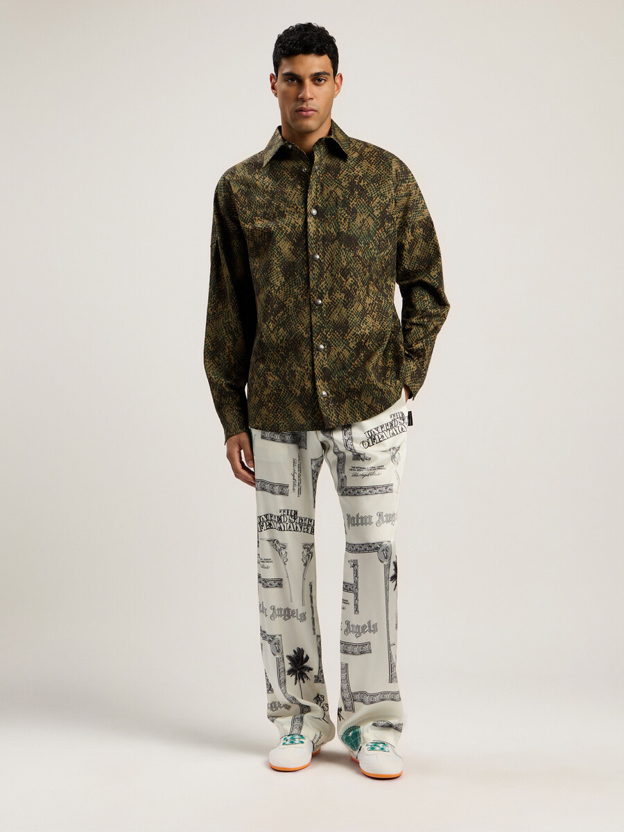 pantalones anchos con estampado de dólares