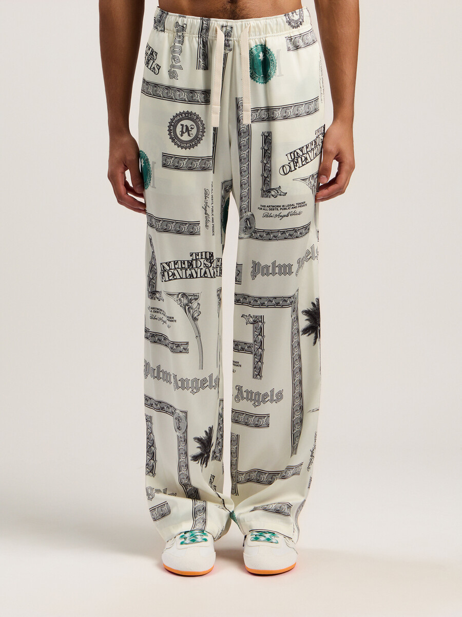 pantalones anchos con estampado de dólares