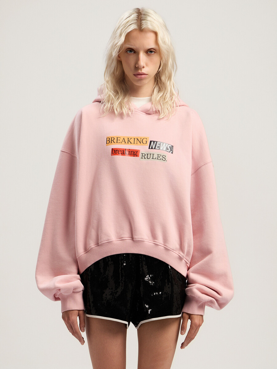 sudadera corta con capucha y cita de paxlatimes