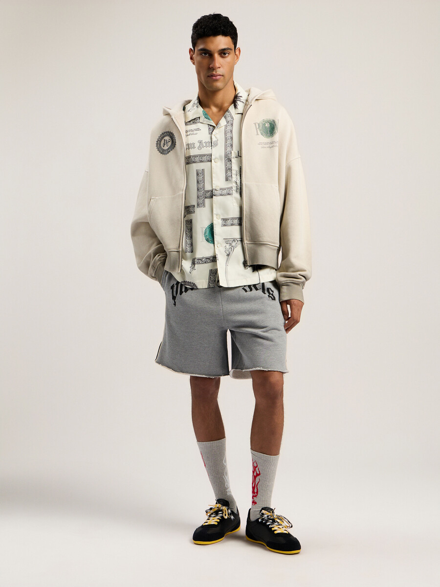 sudadera holgada con cremallera y dólar